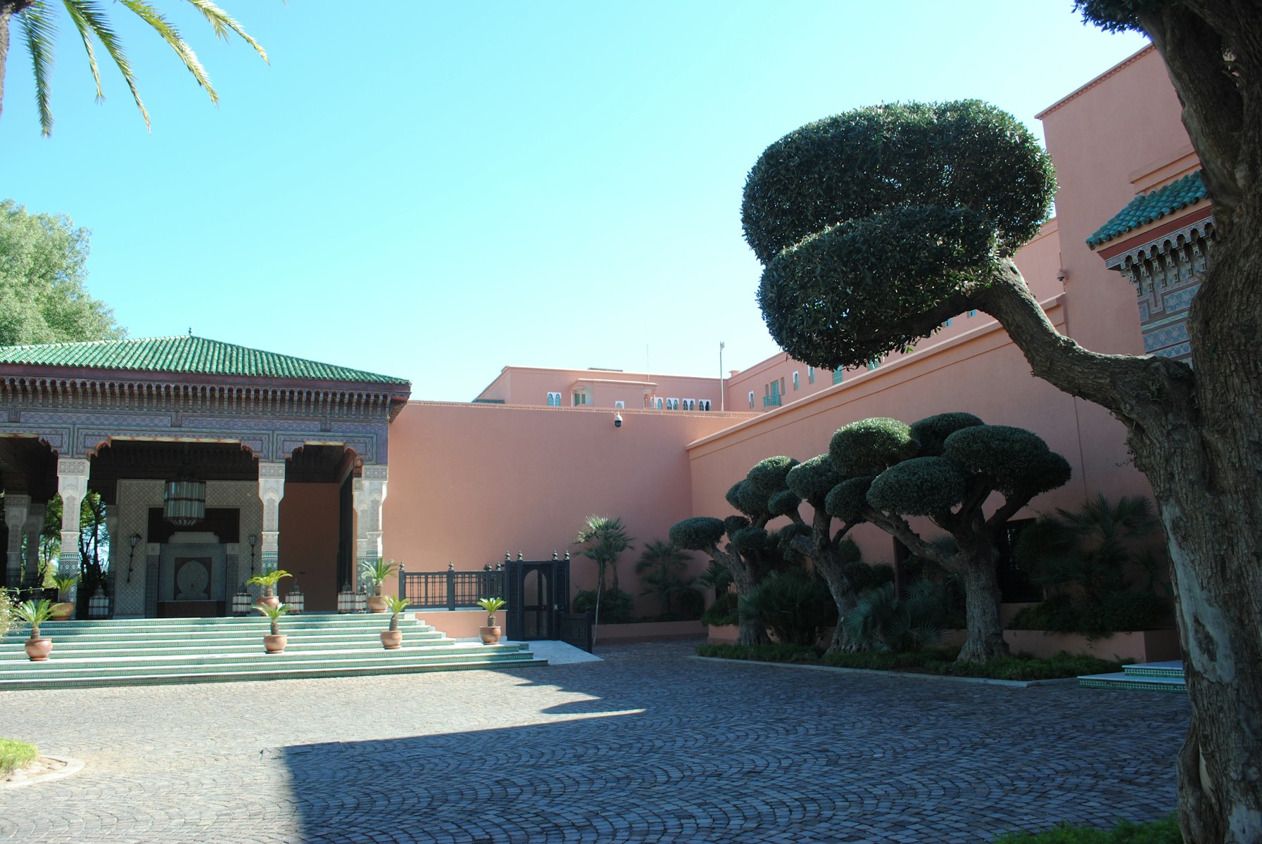 Villa exterior with trees during daytime